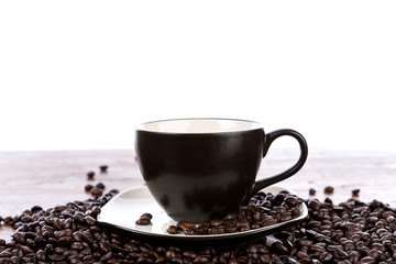 Coffee cup and beans