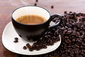 Coffee cup and beans
