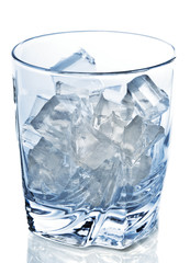 Glass with ice cubes closeup