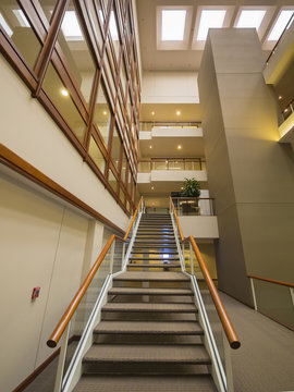 Stairs leading to second floor of office building