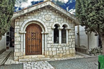beautiful stone house in a cemetery