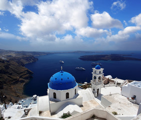 Fototapeta na wymiar Santorini with churches and sea view in Greece