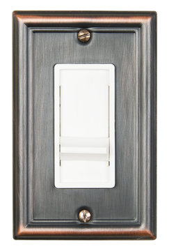 Dimmer light switch with decorative plate