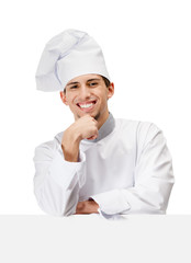 Chef cook in uniform props head with hand, isolated on white