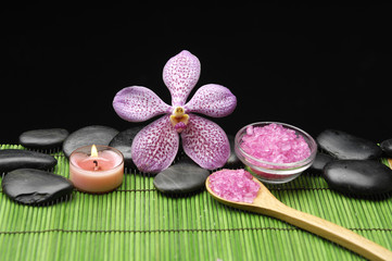 Obraz na płótnie Canvas Spa setting with Pink orchid, candle with zen stone