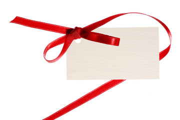 Blank gift tag tied with a satin ribbon.
