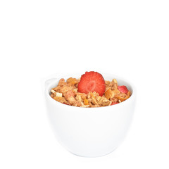 Healthy breakfast with cereals, strawberry in a cup