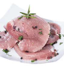Raw Cutlets on a plate (white)