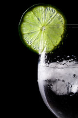Glass with lime and ice