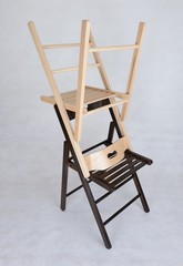 Fototapeta premium Folding lungs and strong wooden chairs from a beech