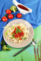 Tasty spaghetti with sauce and vegetables