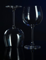 Two glasses on dark blue background