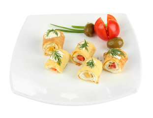 Egg rolls with cheese cream and paprika,on plate, isolated