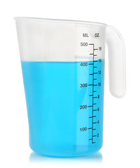 Measuring cup with blue liquid isolated on white