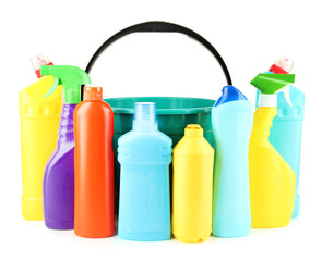Colorful plastic detergent bottles with bucket, isolated