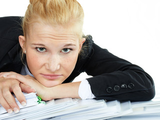 Business woman at work has a headache