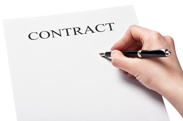 hand with pen signing a contract