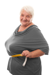 fat woman measuring waist
