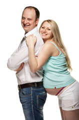 Happy pregnant woman with her husband