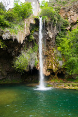 Waterfall along the Dourdou river, route de Conques