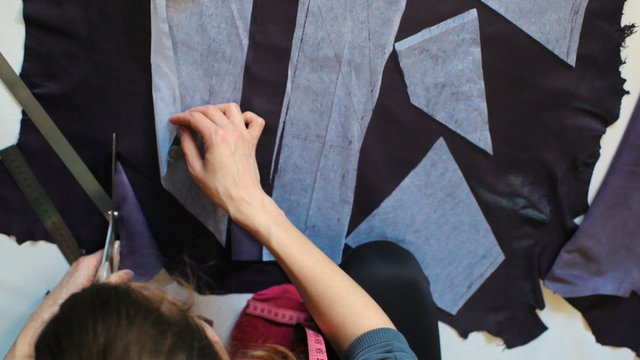 designer skin with scissors cuts the patterns