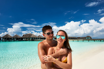 Obraz premium Couple on a beach at Maldives