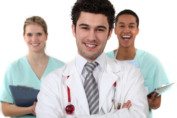 Doctor and nurses laughing