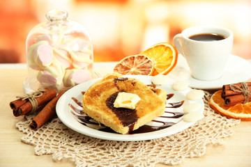 White bread toast with chocolate and cup of coffee in cafe