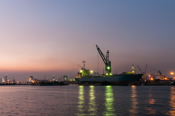 Industrial shipping port in the twilight in Bangkok, Thailand
