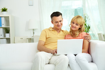 Fototapeta premium Couple with laptop