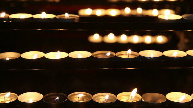Burning candles in the St. Stephan cathedral, Vienna, Austria