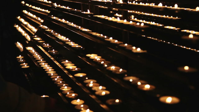 Burning candles in the St. Stephan cathedral, Vienna, Austria