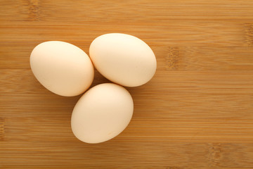 Fresh egg on wood table