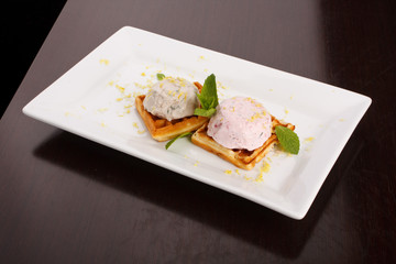 delicious strawberry ice cream with waffle