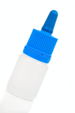 Clean white plastic bottle with a blue cap-dropper