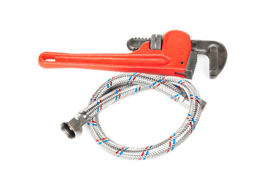 Monkey wrench water hose in a metal shell