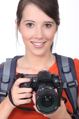 Woman with a digital camera