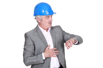 Architect checking the time