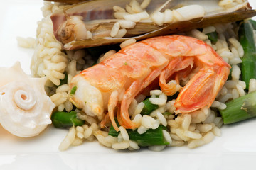 delicious risotto with asparagus, razor shell and prawn