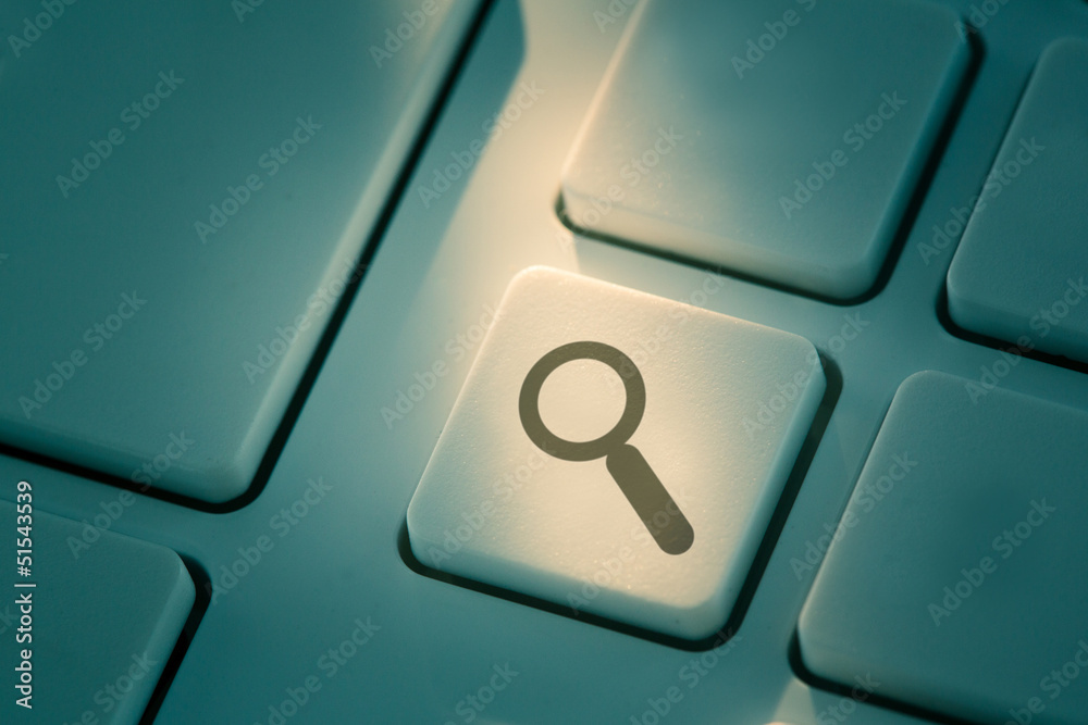 Poster black maghifying glass button on keyboard