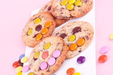 face on chocolate chip cookie