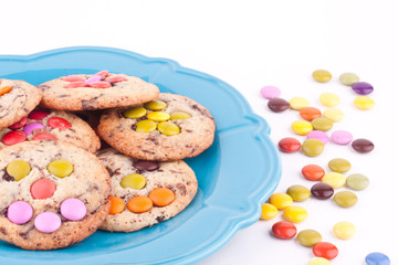 face on chocolate chip cookie