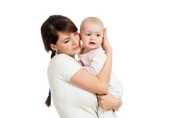 Mother hugging her baby isolated