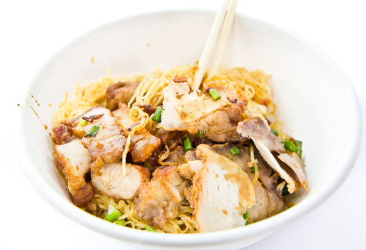 Chinese noodle with pork in bowl