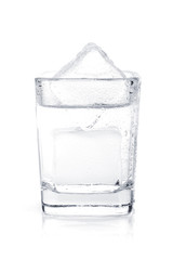 Shot of vodka with ice cubes