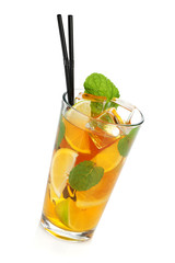 Glass of ice tea with lemon, lime and mint