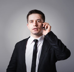  young businessman using smart phone