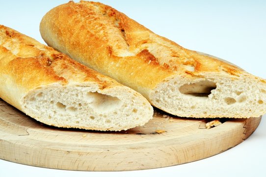 French baguette cut in half © Arena Photo UK