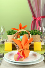 Easter table setting on color background