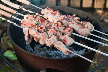 Shish kebab preparation on a brazier